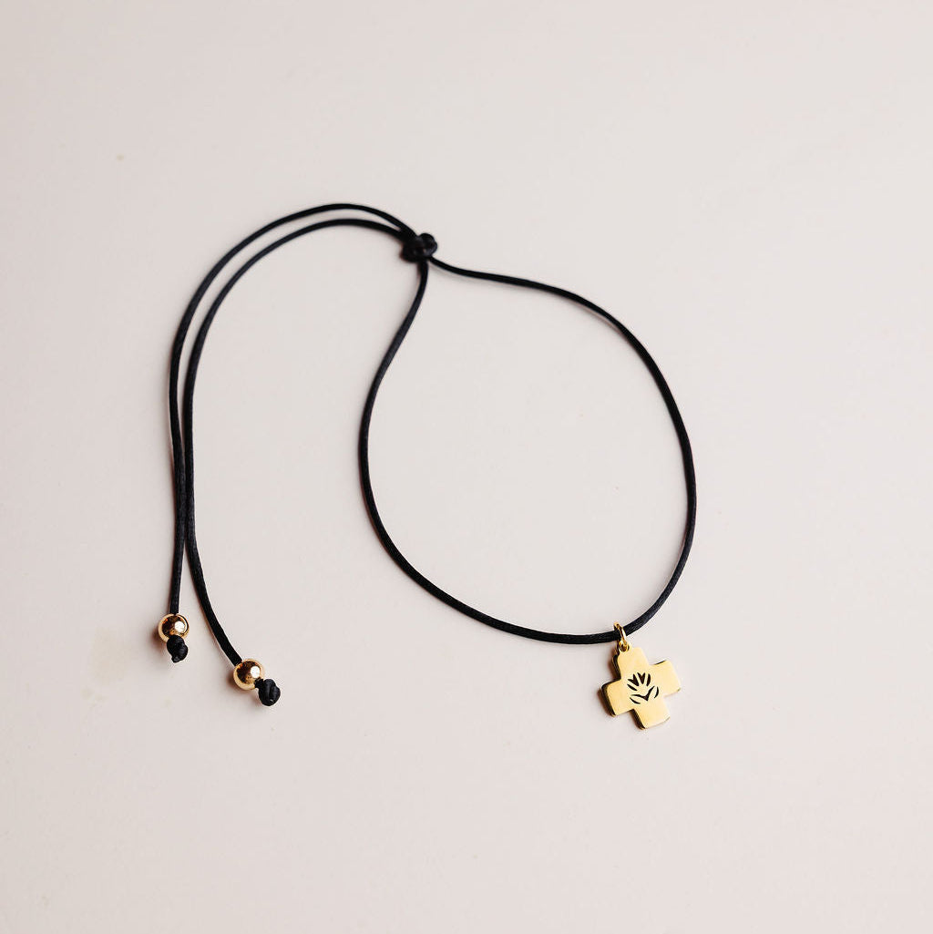 Cross cord necklace